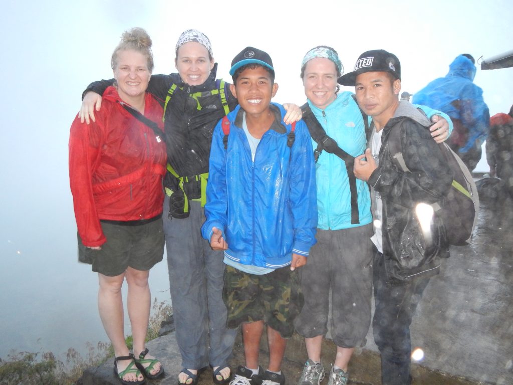 A soaking wet group after hiking in Bali