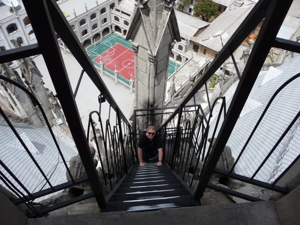 Church steps in Quito, Ecuador, tour group challenges