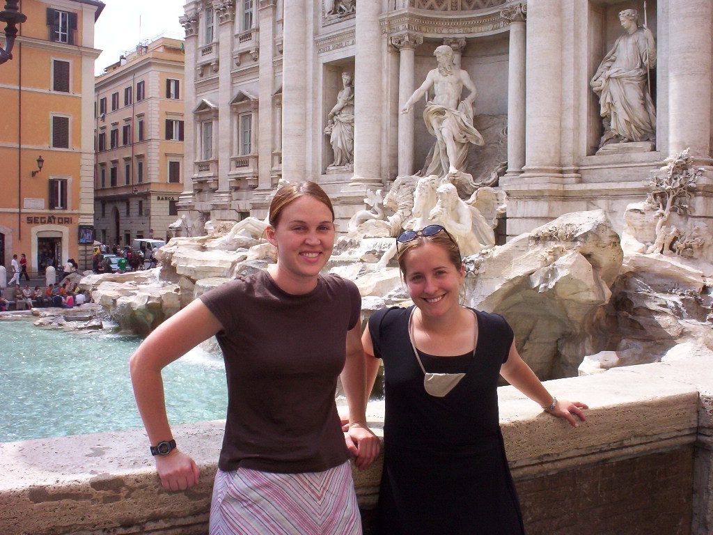 Standing in front of Trevi Fountain