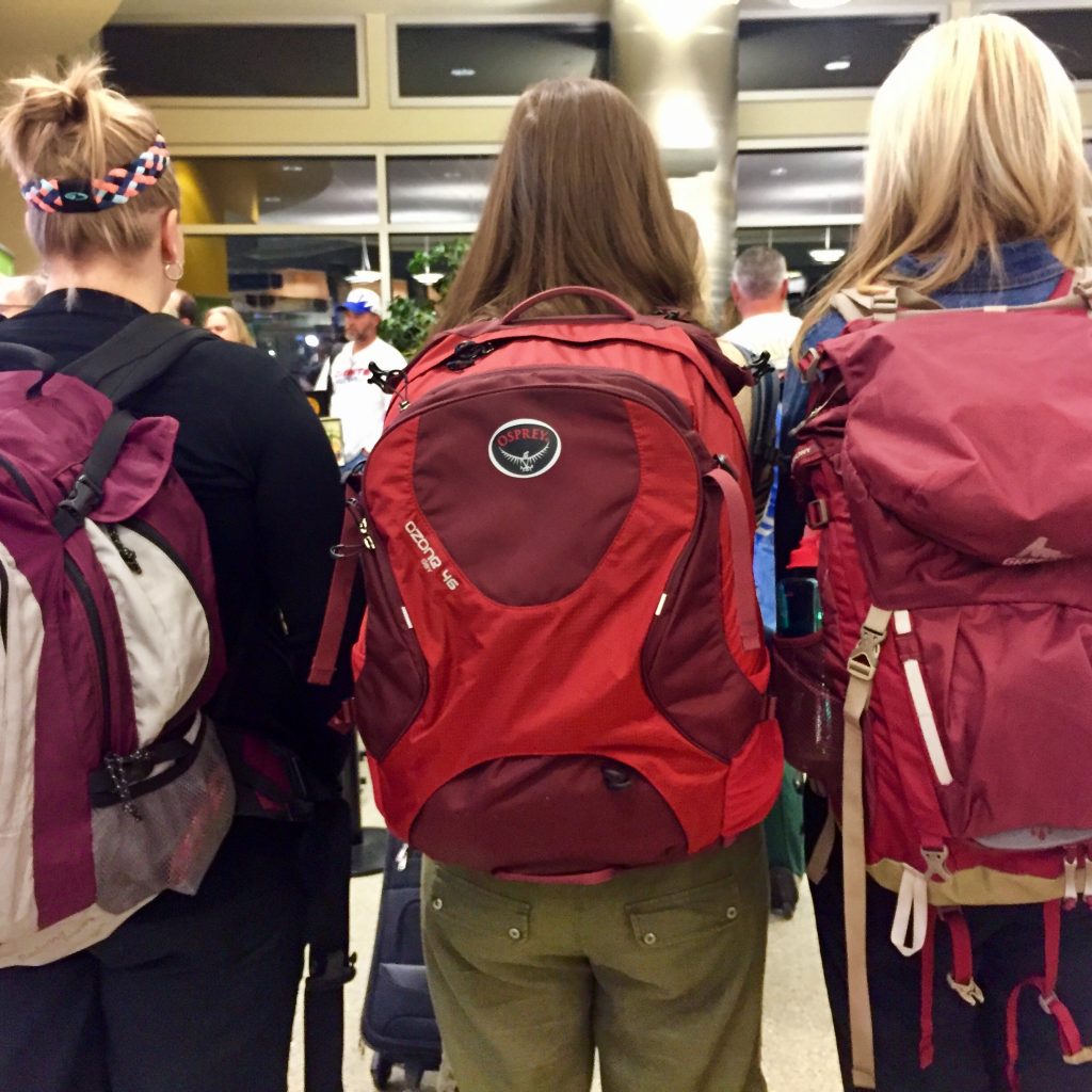 Three red carry-on backpacks were part of my packing list for Puerto Rico
