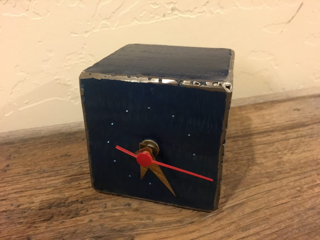 Metal clock souvenir from Tallinn, Estonia