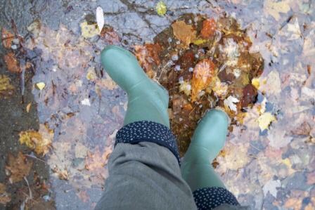 Green rain boots fall leaves train travel tips for Canada women travelers vacation