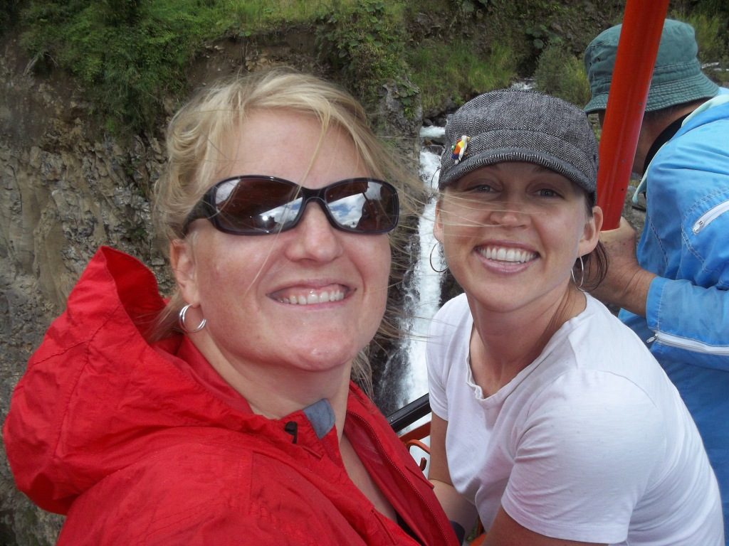 Friends at a waterfall in Ecuador thanks to travel thanksgiving friends women travelers