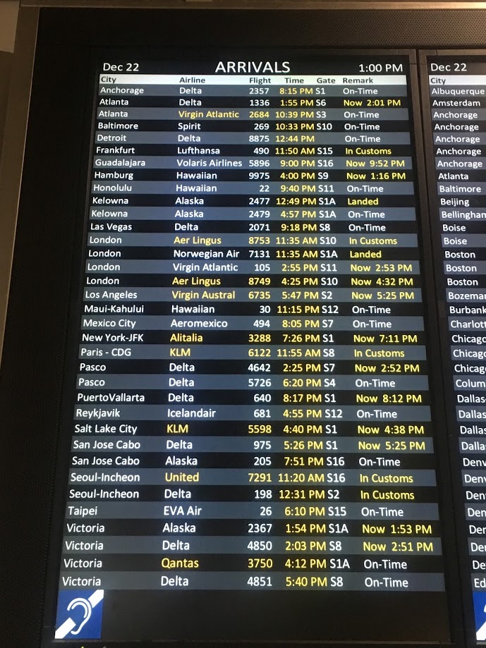 airport arrivals reader board, delayed flights, not-so-fun travel