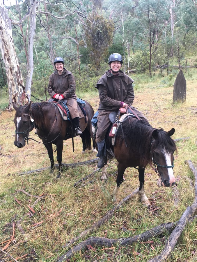 Riding horses in Australia in the rain, Snowy River style
