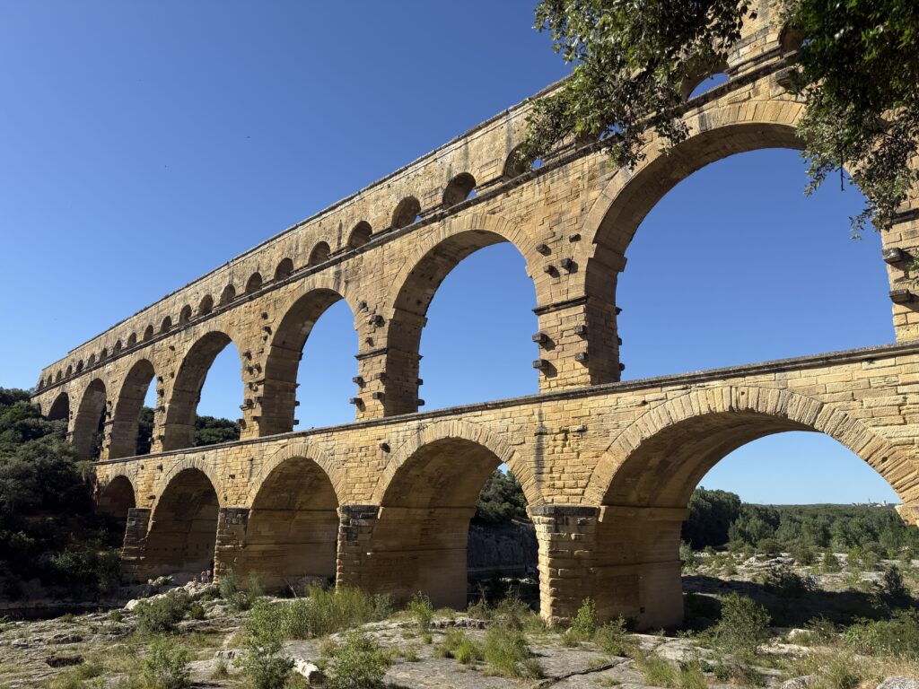 Arched bridge with blue sky.