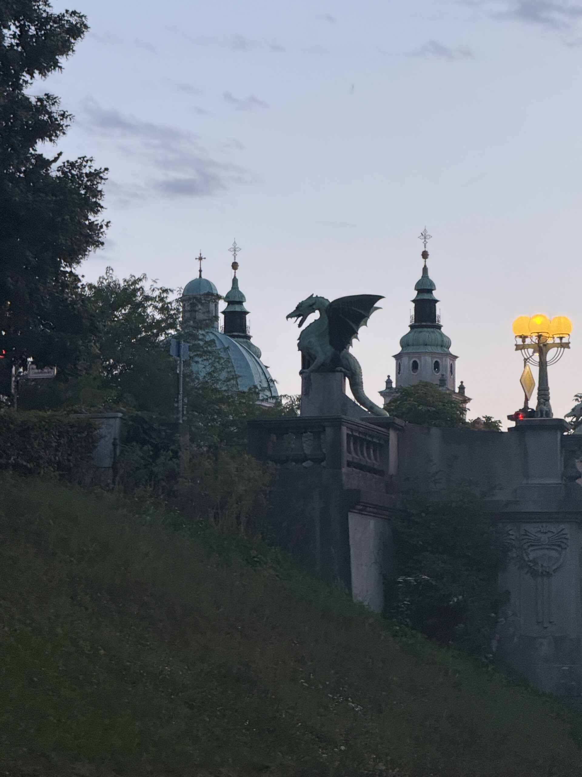 view of city with dragon sculpture