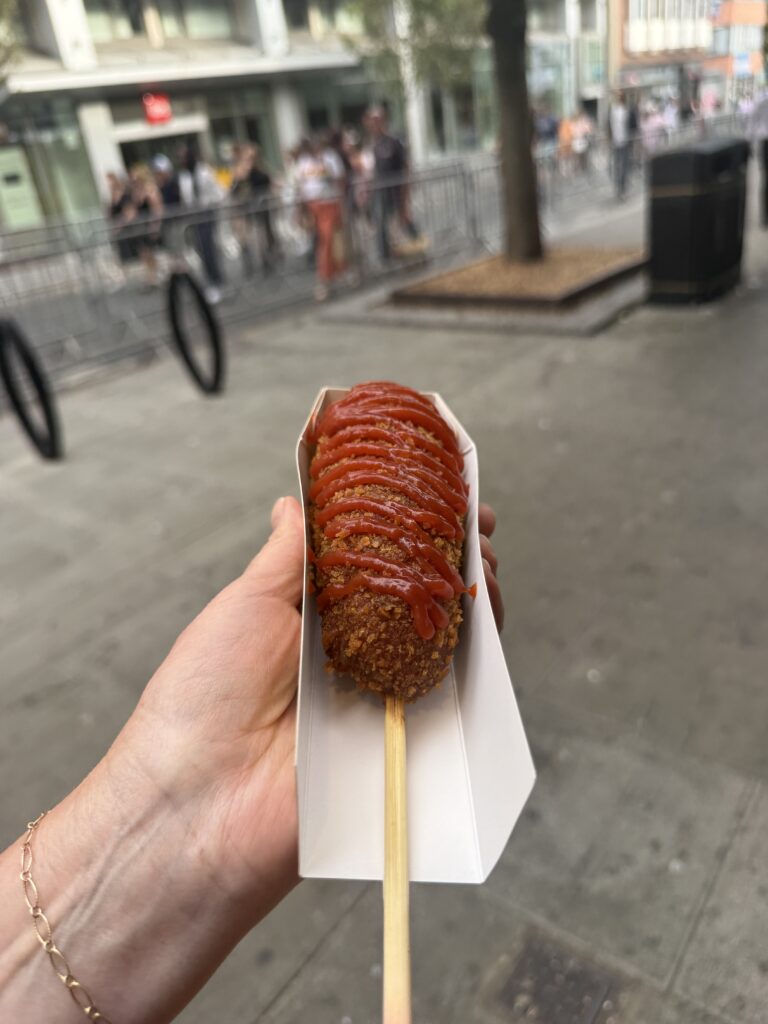 corn dog with ketchup