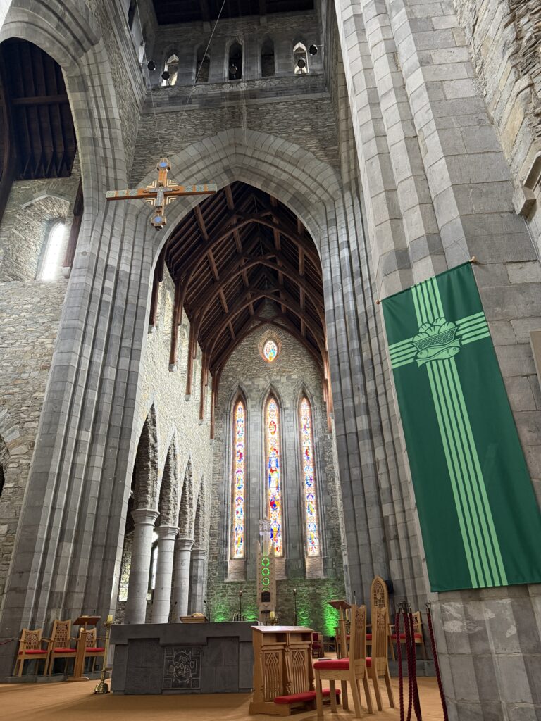 inside of church with green banner.