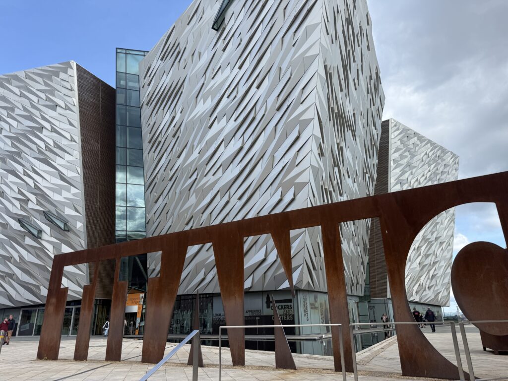 building with metal in front that says Titanic