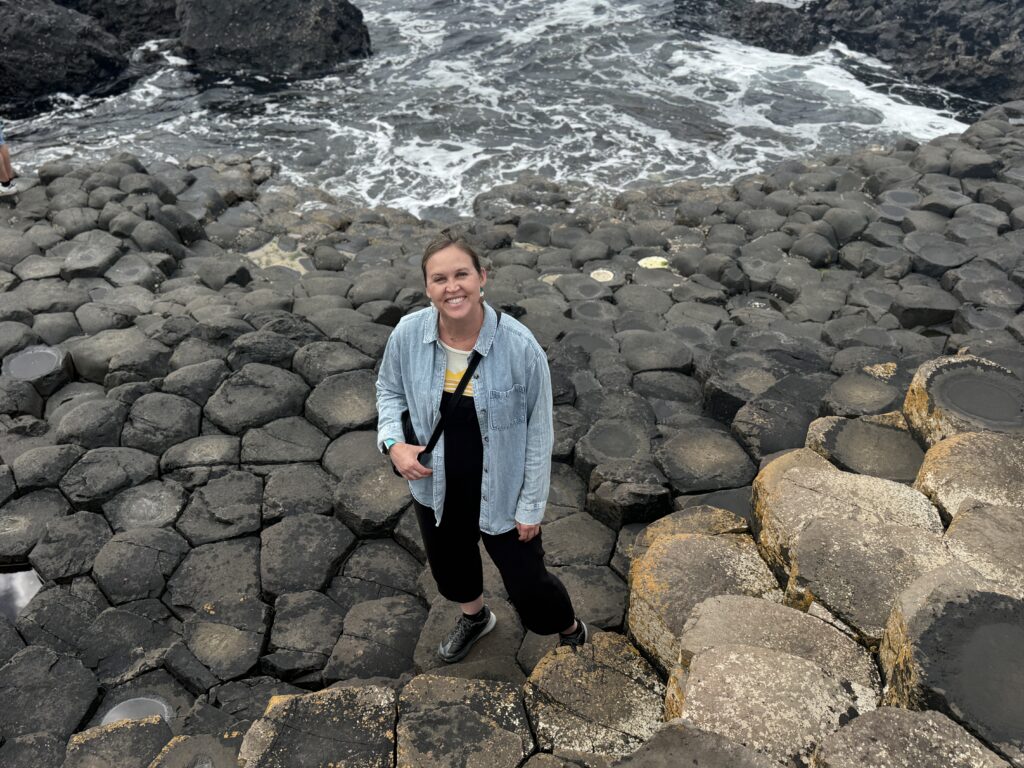 woman in front of rock formations