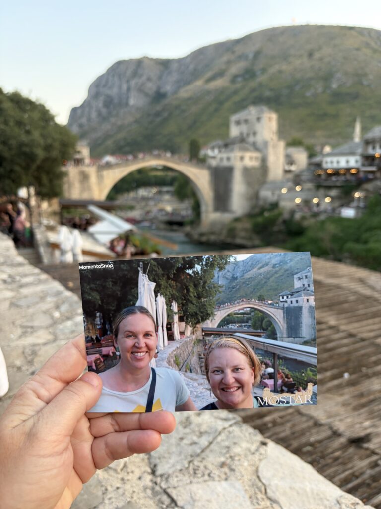 photo in front of a stone bridge