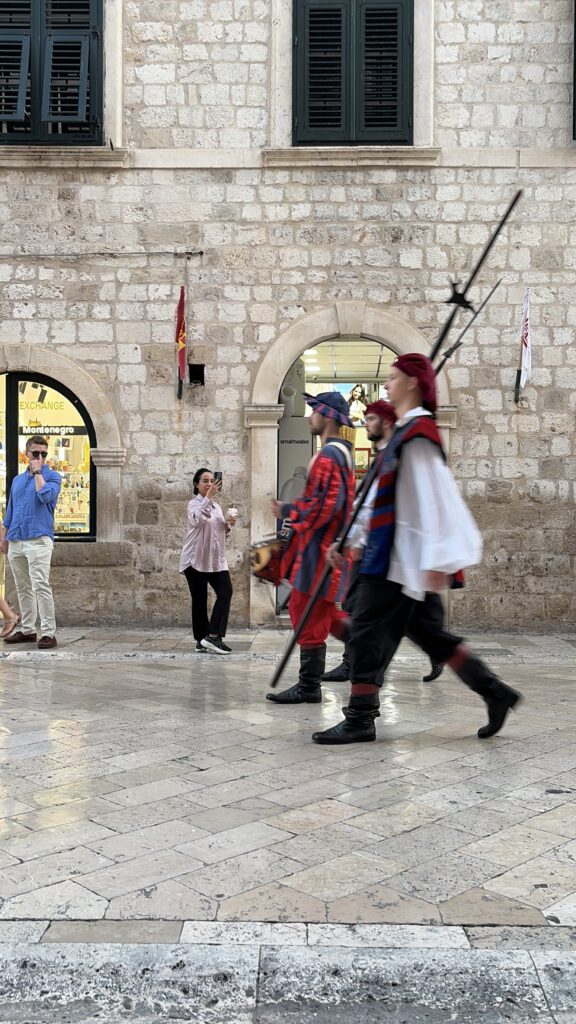 men wearing old fashioned clothes