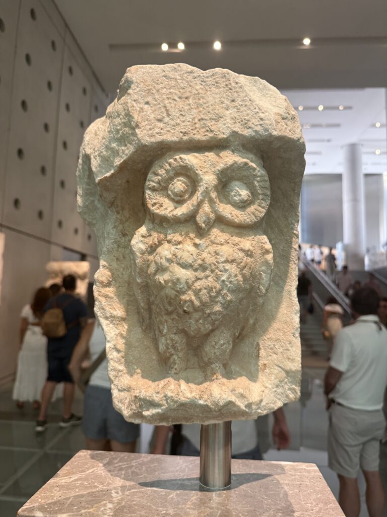 carved owl statue in stone