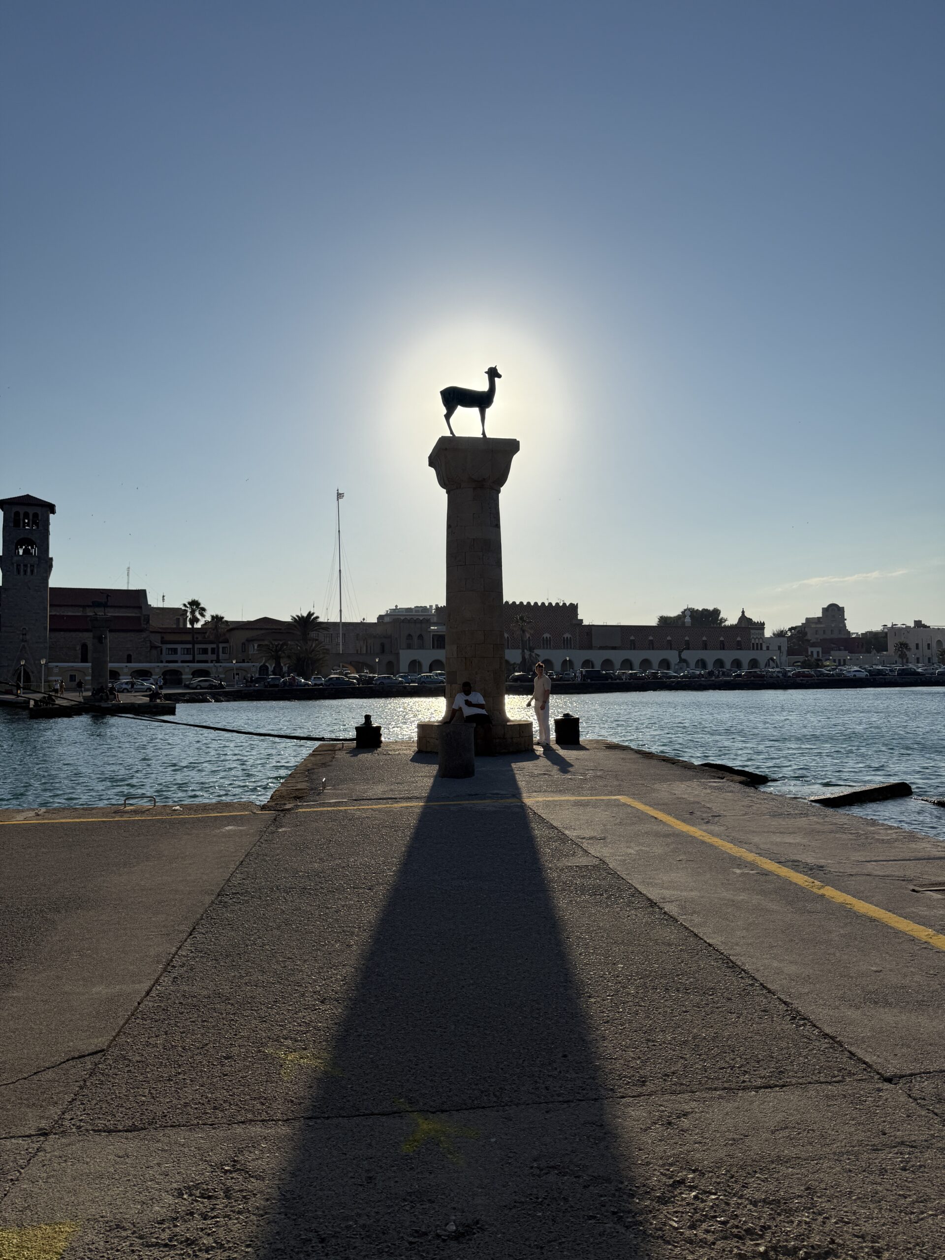 Sun behind a column