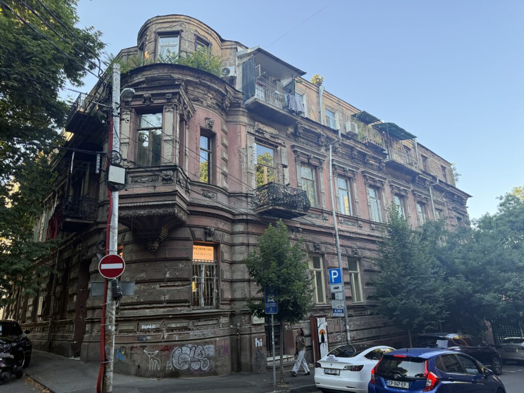 Large city building with graffiti