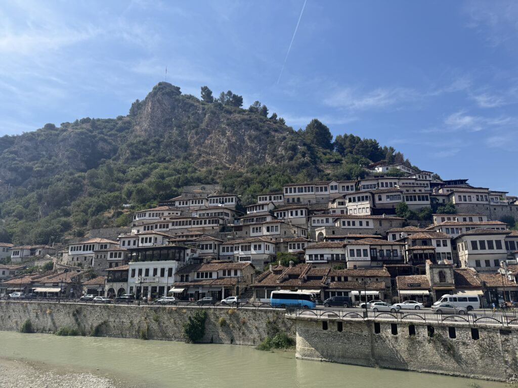Hillside with white buildings with many windows