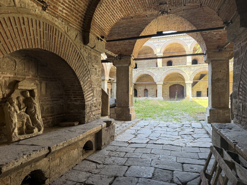 the inner courtyard of a stone house