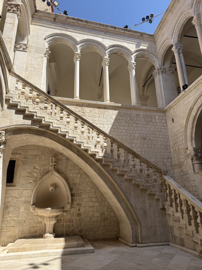 white limestone walls and stairwell