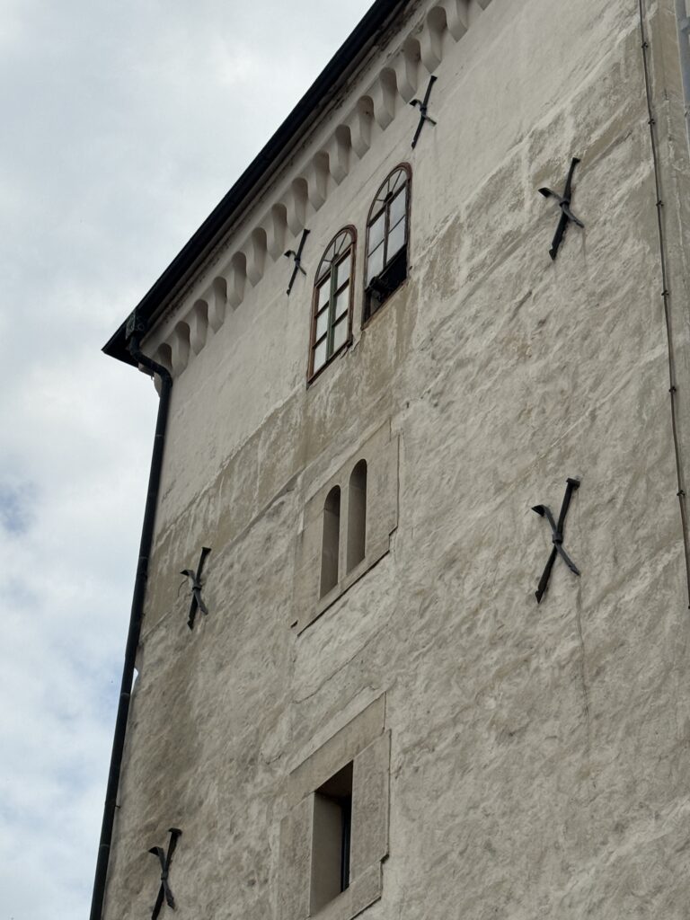 side of a building with a window open